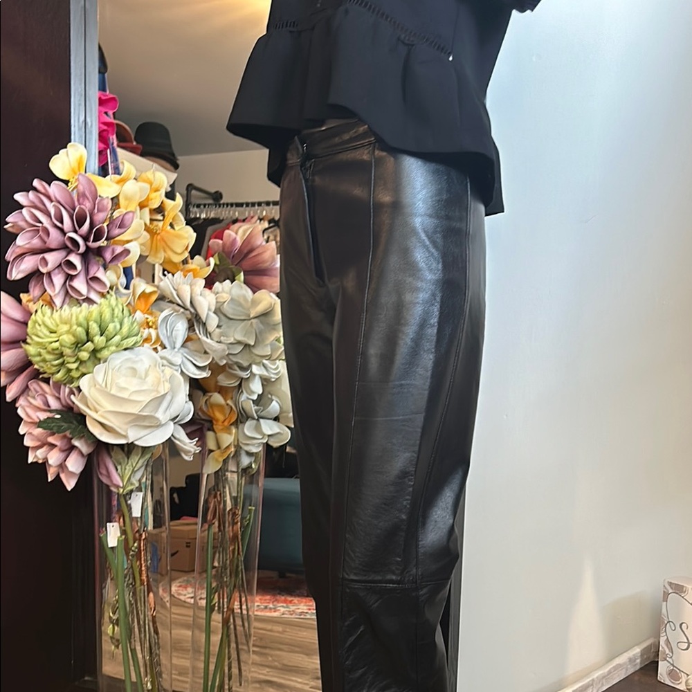 GORGEOUS DANIER Black Leather pants that flare out at the bottom with a zipper. - Picture 9 of 15